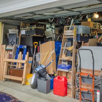 a cluttered garage needing a clean out service